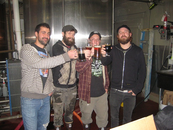 Anders Fridén, far right, takes a break with the brewers at Great Divide.