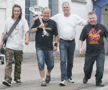 Pictured: METALRUZZ (Kim Thyge Jensen is second from right, wearing a white long-sleeved shirt) Photo courtesy of Ugenyt