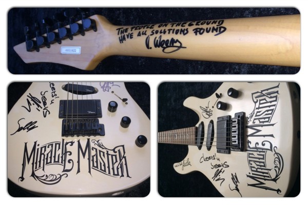 TattooedWomanGuitar-600x400