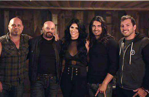 On the set of “Bittersweet Seduction”: Guitarist Eric Horton and Lead Vocalist Jon Campos with Ashley Ridge, their “lovely and talented leading lady”, Mattias Anderson DeCosta, their “lovely and talented leading man”, and friend Henry from Germany.